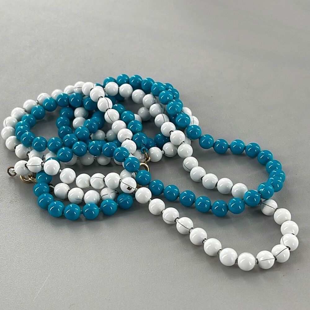 Set of two enamel painted metal strand of beads